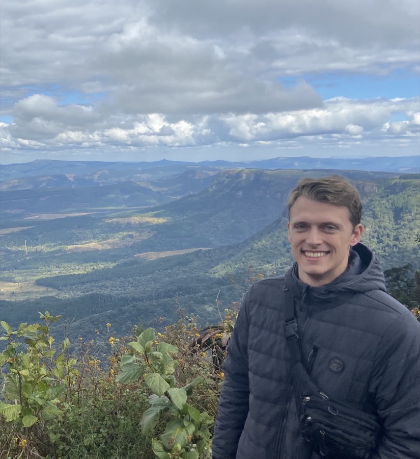 Charl Botha overlooking a mountain landscape